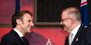 French President Emmanuel Macron was happy to gladhand Anthony Albanese but he is still critical of the AUKUS pact. 