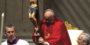 Pope Francis leads the liturgy of the passion on Good Friday in St. Peter’s Basilica at The Vatican.