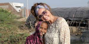 Fashion designer and burgeoning philanthropist Camilla Franks with her friend Jenu on tour in India. 