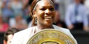 Serena Williams with her winning Wimbledon plate in 2010. 