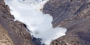 British tourist Harry Shimmin took this video of an ice avalanche caused by a glacial collapse,while he was walking in the Tian Shan mountains in Kyrgyzstan.