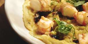Prawn omelette with coriander and chilli crunch.