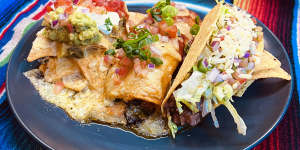 Triple treat:A nacho,enchilada and taco fiesta at Taco Bill.