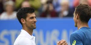 Novak Djokovic of Serbia shakes hands with Vasek Pospisil of Canada after a match in England. The duo are united in their belief in a players’ union.