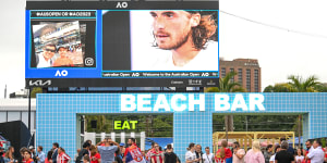 Crowds attending the Australian Open at the beach bar outside Rod Laver Arena for the men’s final. 