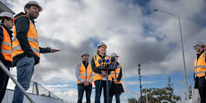 Victorian Premier Jacinta Allan at a level crossing removal project in July. The program is one of those alleged to have overseen wasteful spending.