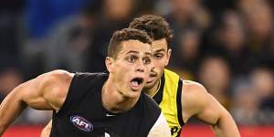 Carlton's Ed Curnow will miss another month with his throat injury. 