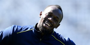 'I want to be treated as one of the boys':Bolt's A-League trial begins