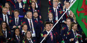 Geraint Thomas of Team Wales leads the parade in uniforms by Julien Macdonald during the opening ceremony of the Commonwealth Games at the Alexander Stadium