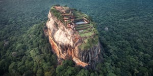 The ruined rock-top palace fortress Sigiriya,reached up a flight of vertigo-inducing steps.