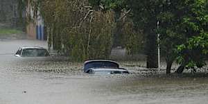 BRISBANE,AUSTRALIA - MARCH 09:Flooded cars at Edmondstone Street in the suburb of Newmarket on March 09,2025 in Brisbane,Australia. Australia’s east coast is experiencing severe weather as ex-Tropical Cyclone Alfred moves south. While downgraded from cyclone status,the weather system continues to bring damaging winds,heavy rainfall,and flash flooding,particularly in the Gold Coast and northern NSW regions. Authorities have issued severe weather warnings,and coastal areas remain at risk of significant erosion and hazardous surf conditions. Residents are urged to stay updated on local warnings,avoid floodwaters,and prepare for ongoing disruptions. (Photo by Albert Perez/Getty Images)