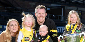 Jack Riewoldt,pictured with his wife Carly and children Hazel,Tommy and Poppy,after announcing his retirement.
