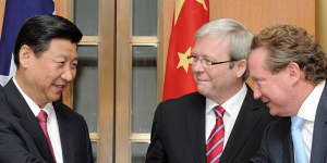 June 2010:Then vice-president and now President Xi Jinping,left,shakes hands with Fortescue Metals Group CEO Andrew Forrest as prime minister Kevin Rudd looks on in Canberra. 