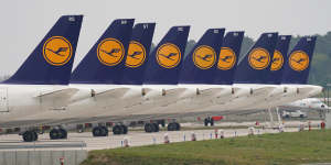 Passenger planes of German airliner Lufthansa stand parked and not in use at Willy Brandt Berlin Brandenburg International Airport