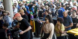 Fans queue to go through security at AAMI Park in late December 2022.