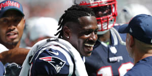 Troubled Brown scores touchdown on Patriots debut