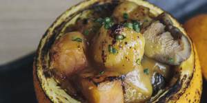 Roast umami vegetables with orange miso in an orange pot.