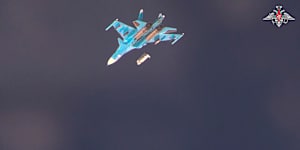 An SU-34 drops a glide bomb over Ukrainian positions in an image released by the Russian Defence Ministry last year.