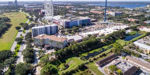 2A92N4W Orlando Florida,Universal Boulevard,The Wheel at ICON Park,Orlando Starflyer swing aerial view overhead,xxorlando