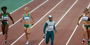 Cathy Freeman hits the front in the 400-metre final.