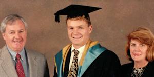 Matt Thistlethwaite with his parents at his university graduation.