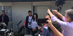 Ardern with partner Clarke Gayford in January,announcing her pregnancy outside their home.