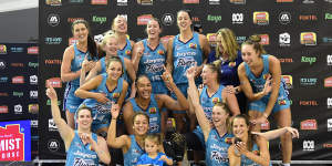 Southside Flyers celebrate after their 2020 WNBL grand final victory.