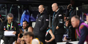 Port Adelaide Power coach Ken Hinkley watches from the bench during his side’s match against the Adelaide Crows.