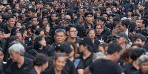 Thai mourners line up ahead of the Royal Cremation ceremony in Bangkok on Wednesday.