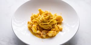 Spaghettini,with the golden glow of saffron,and prawns.