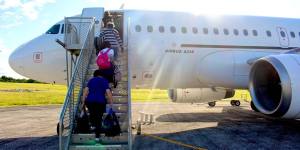 Australians who were evacuated from Wuhan leave Christmas Island on Tuesday.