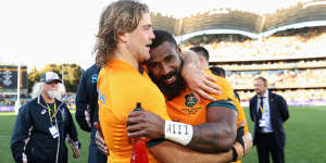 Australia’s tryscorers Fraser McReight and Marika Koroibete savour a win after the Wallabies’ win over South Africa in Adelaide last year.