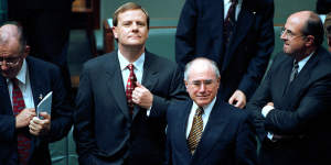 Peter Costello,John Howard and Peter Reith in 1999.
