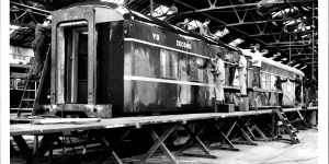 Painters at Newport Workshops in 1973 put finishing touches on the Victorian Railways new luxury twinette carriage which will be operated with the Spirit of Progress train.
