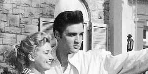 Elvis Presley with his girlfriend Yvonne Lime at Graceland around 1957.