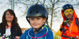 Families light up Gungahlin for glow-in-the-dark bike ride