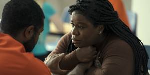 Uzo Aduba with Jamaal Grant in Painkiller:ties all the contradictory strands together.