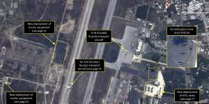 Major commitment:a satellite image shows Russian transport aircraft,helicopters,tanks,trucks and armoured personnel carriers at an air base in Latakia in Syria.