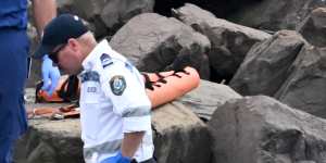 Emergency services by The Gravel Loader Dive Site on Saturday morning,where a man was declared dead.