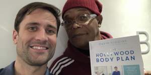David Higgins and Samuel L Jackson with his book'The Hollywood Body Plan'.