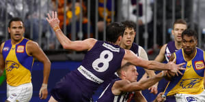 Wobbly Dockers beat Eagles in feisty derby