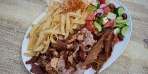 The yeeros plate with fresh-cut chips and Greek salad.