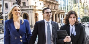 Surgeon Munjed Al Muderis,centre,outside the Federal Court in Sydney on Monday,and his barrister Sue Chrysanthou,SC,right.