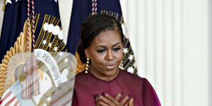 Michelle Obama is careful to say her relationship with her husband isn’t perfect,but they do seem closely synced.