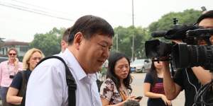 Asked about the condition of his clients,lawyer Zhai Jian replied"pretty good".