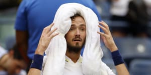 Daniil Medvedev cools down during his match against Andrey Rublev.