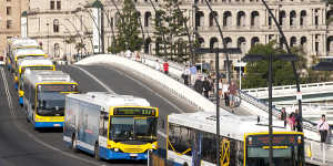 Buses line up across the Victoria Bridge during peak hour in Brisbane.