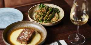 Broccoli on a bed of anchoiade with pangrattato at Onzieme. 