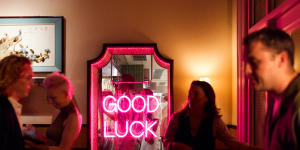 The neon lights of Good Luck Restaurant Lounge. 