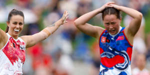 Swan Chloe Molloy celebrates a goal.